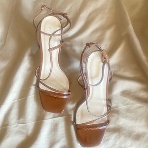 Woman’s Brown Strap 4” Heel size 9